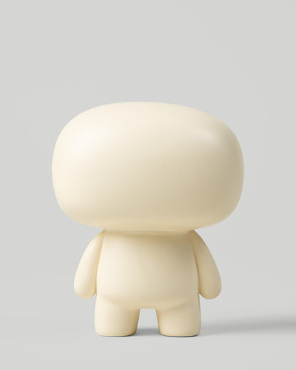 Blumo art toy figure, rear view, on a plain grey background